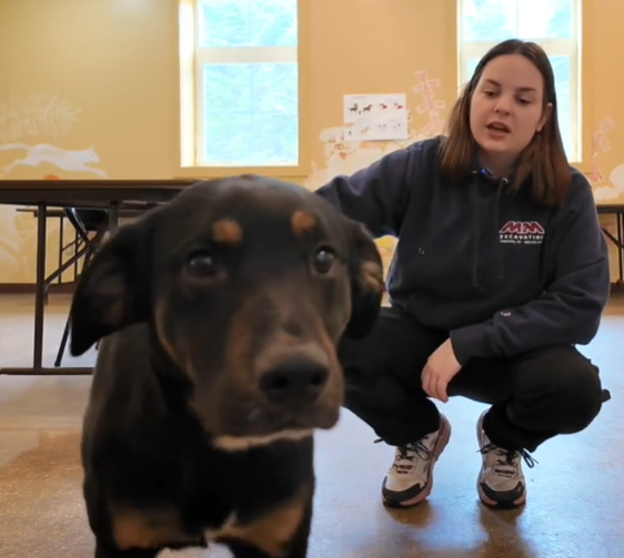 Picture of Mario Johnson with a dog