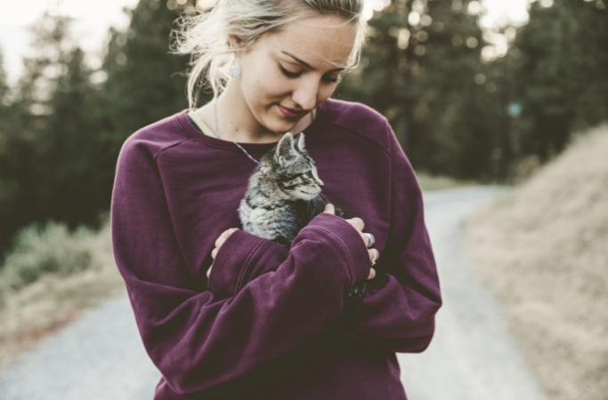 Woman holding cat